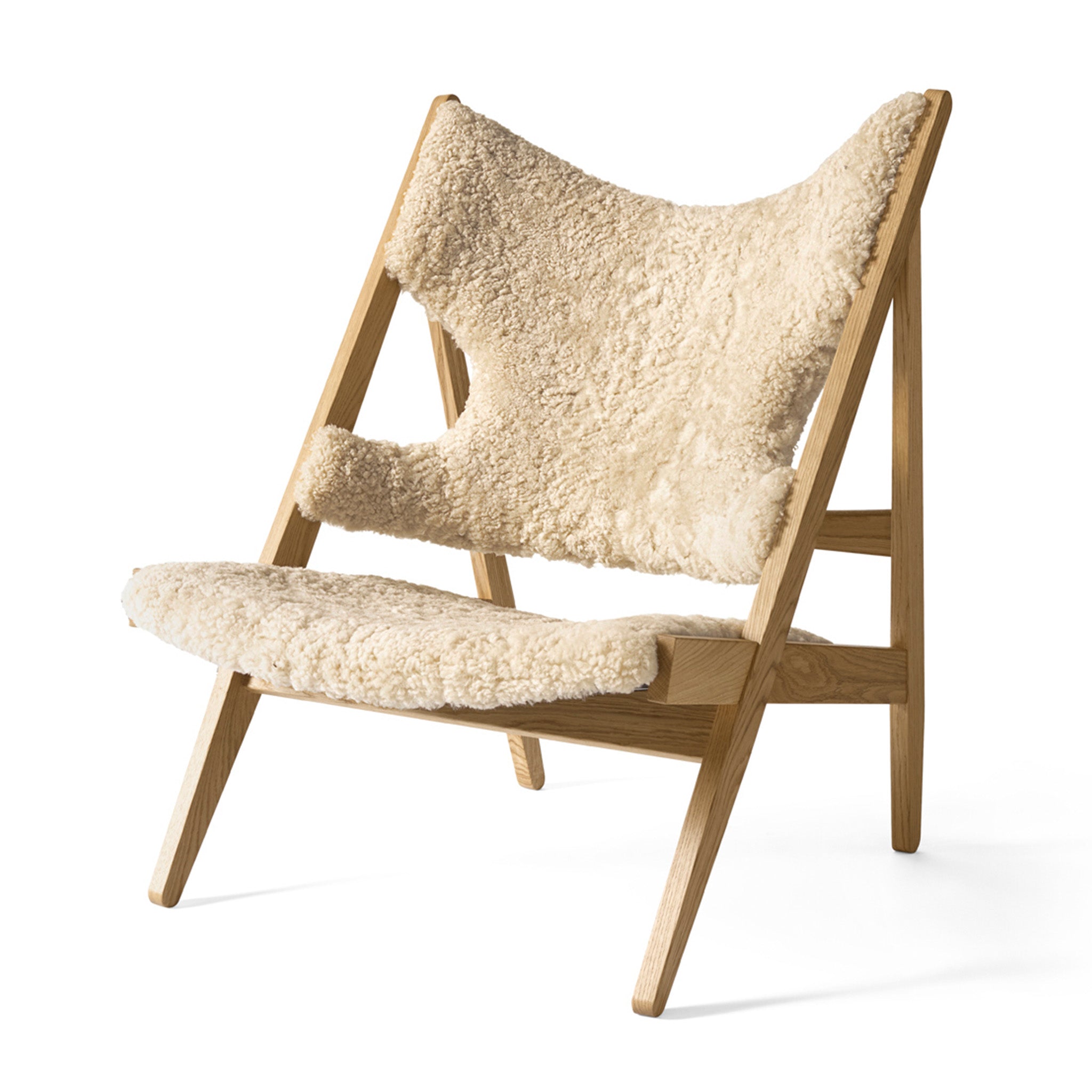 Knitting Chair in Sheepskin by Ib Kofod-Larsen
